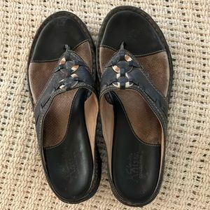 Clark’s artisan label sandals. Comfortable and cute!